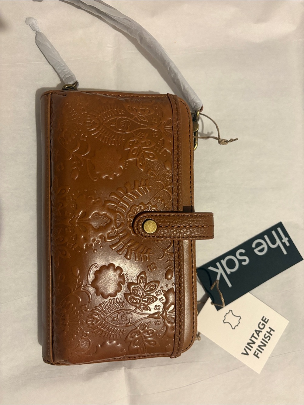 NWT The Sak Embossed Brown Leather Wristlet with crossbody strap